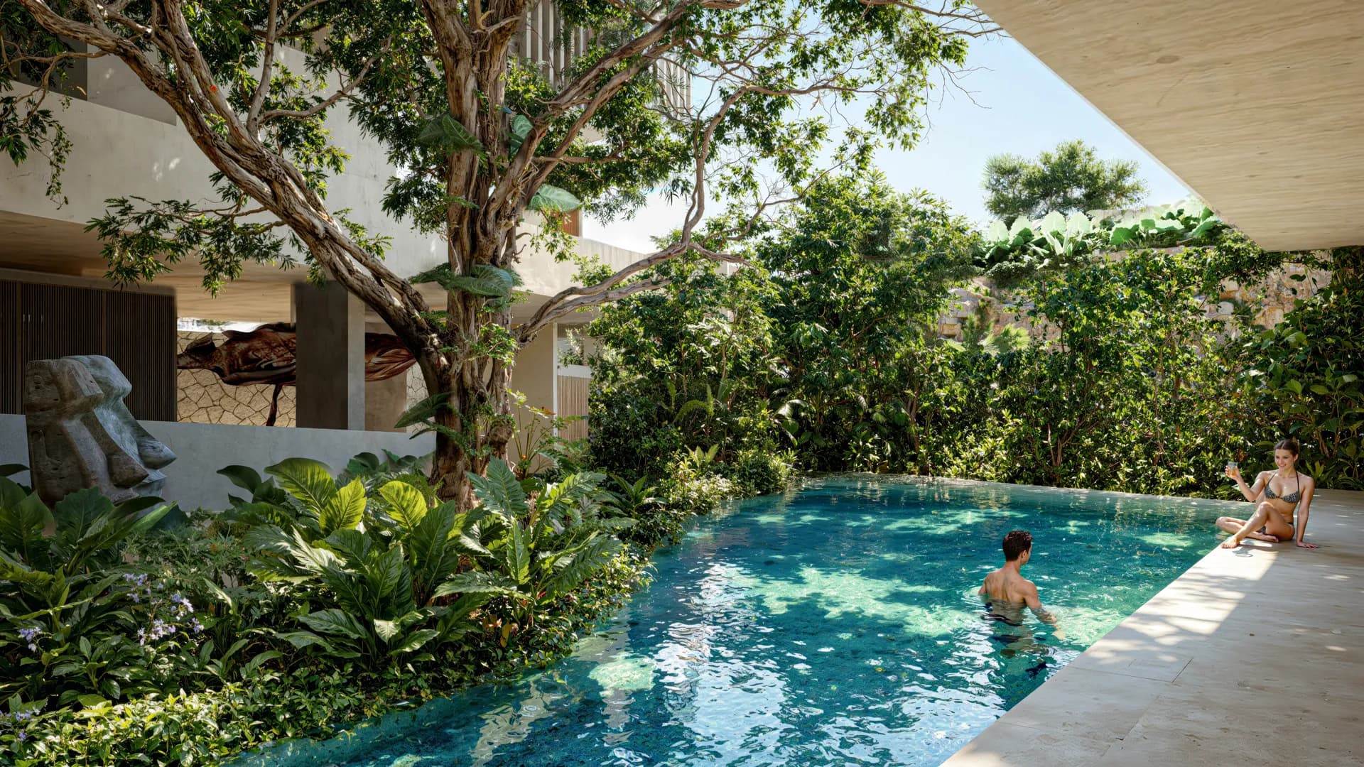 Lush tropical courtyard rendering featuring a cenote-inspired turquoise plunge pool surrounded by dense greenery, mature trees, concrete architecture, and integrated stone sculptures