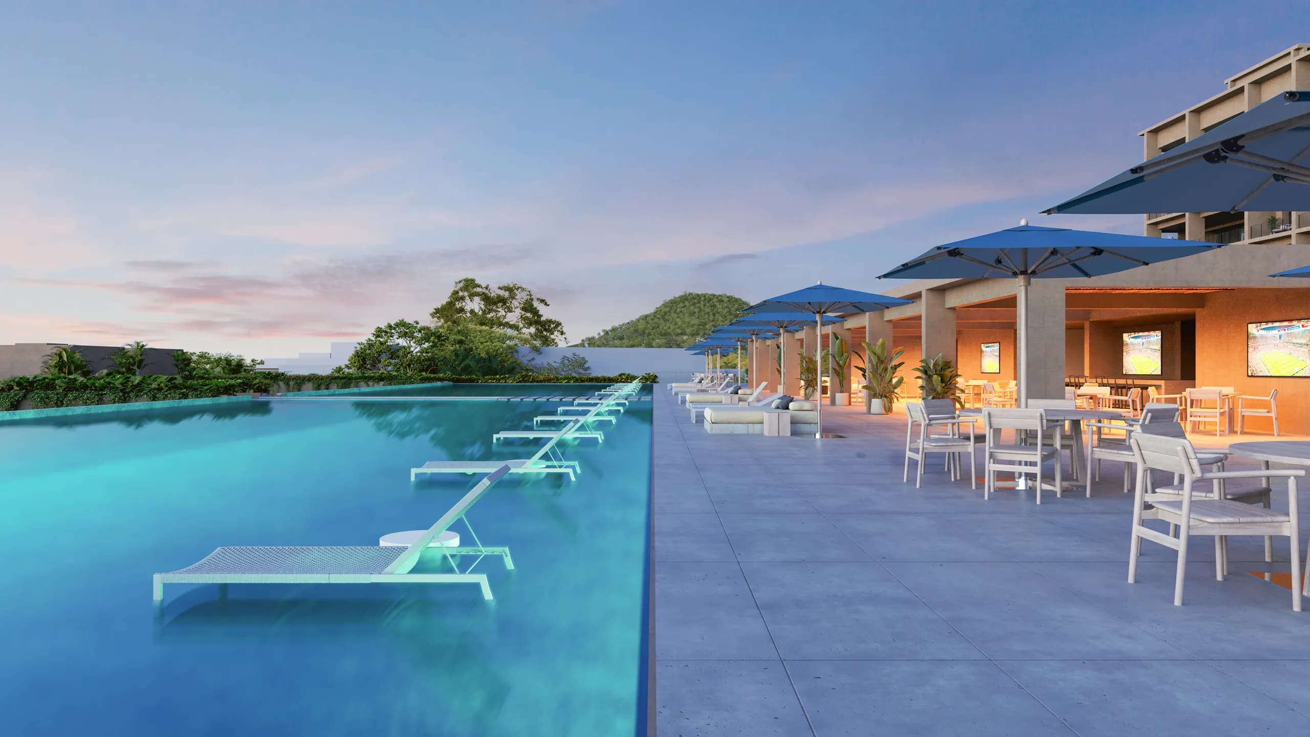 Infinity pool and outdoor social spaces overlooking Litibú