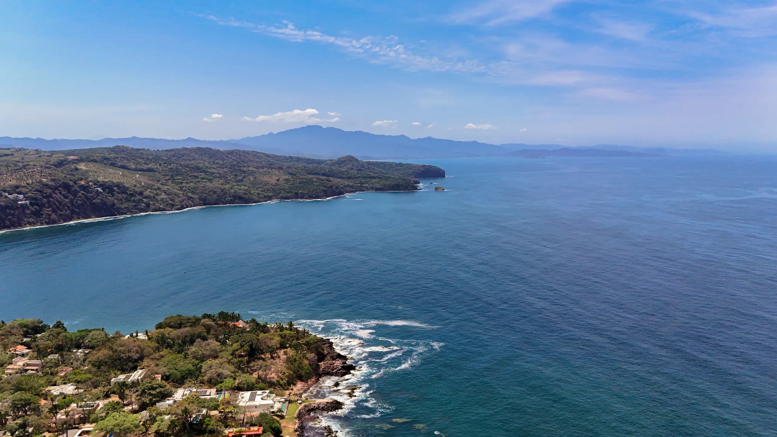 Expansive coastal views across Riviera Nayarit, where tropical landscape meets the Pacific Ocean in a remarkably private setting.