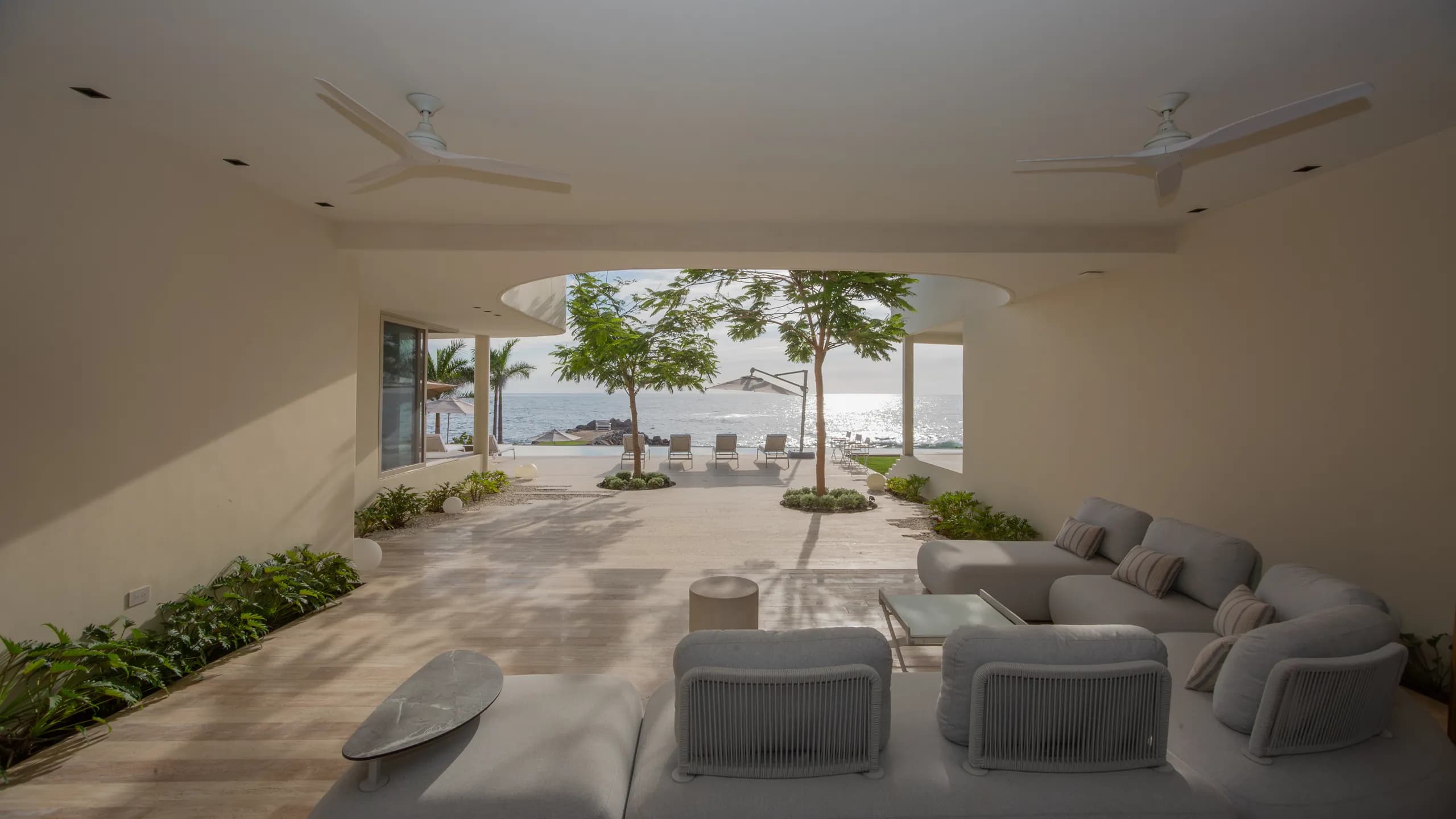 Open-concept living spaces designed to connect seamlessly with the terrace, ocean views, and surrounding natural landscape.
